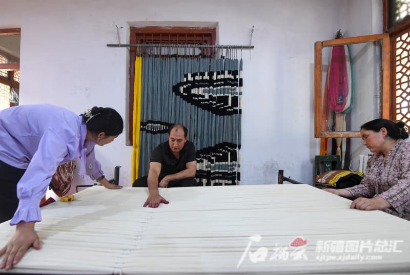 艾德莱斯绸_分条整经_10